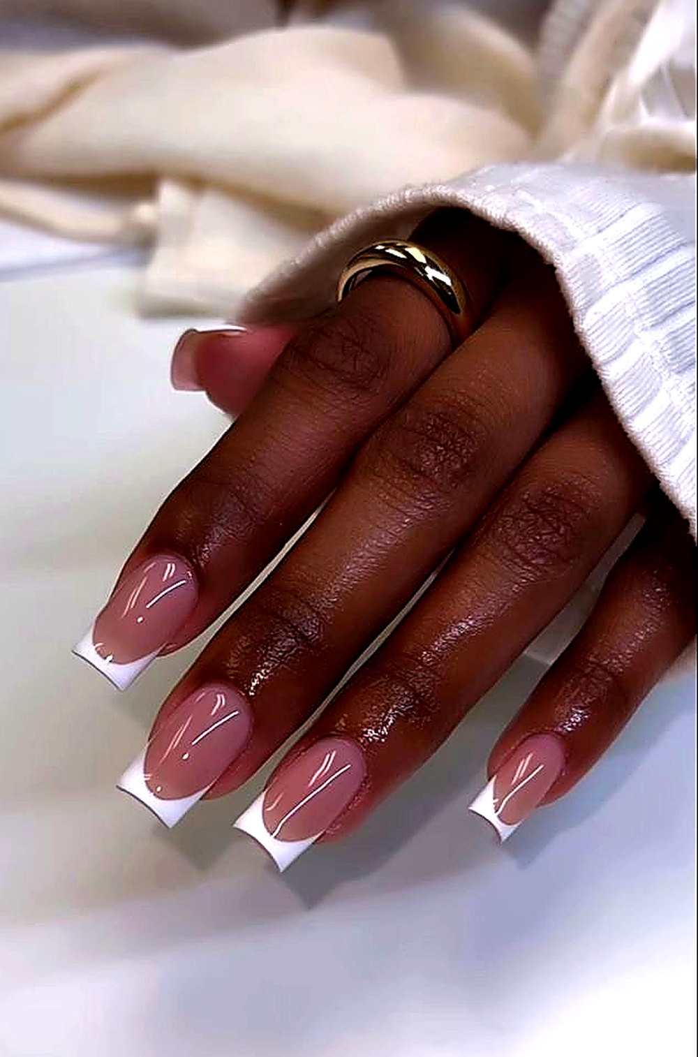 French-tip almond manicure at Coastal Polish & Beauty in Newport Beach