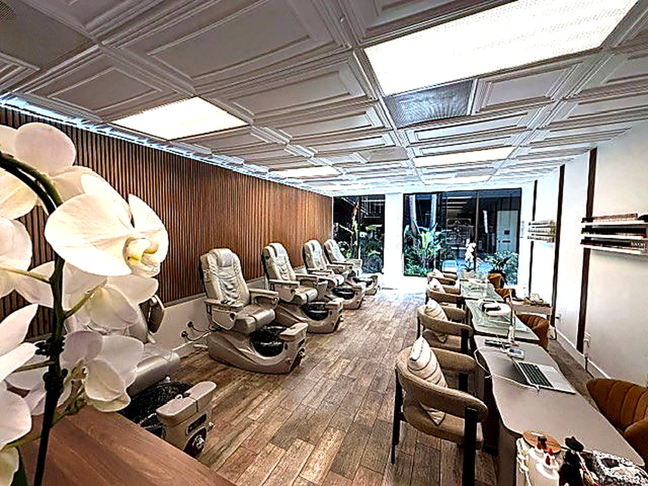Warm pedicure suite welcoming guests at Coastal Polish & Beauty in Newport Beach