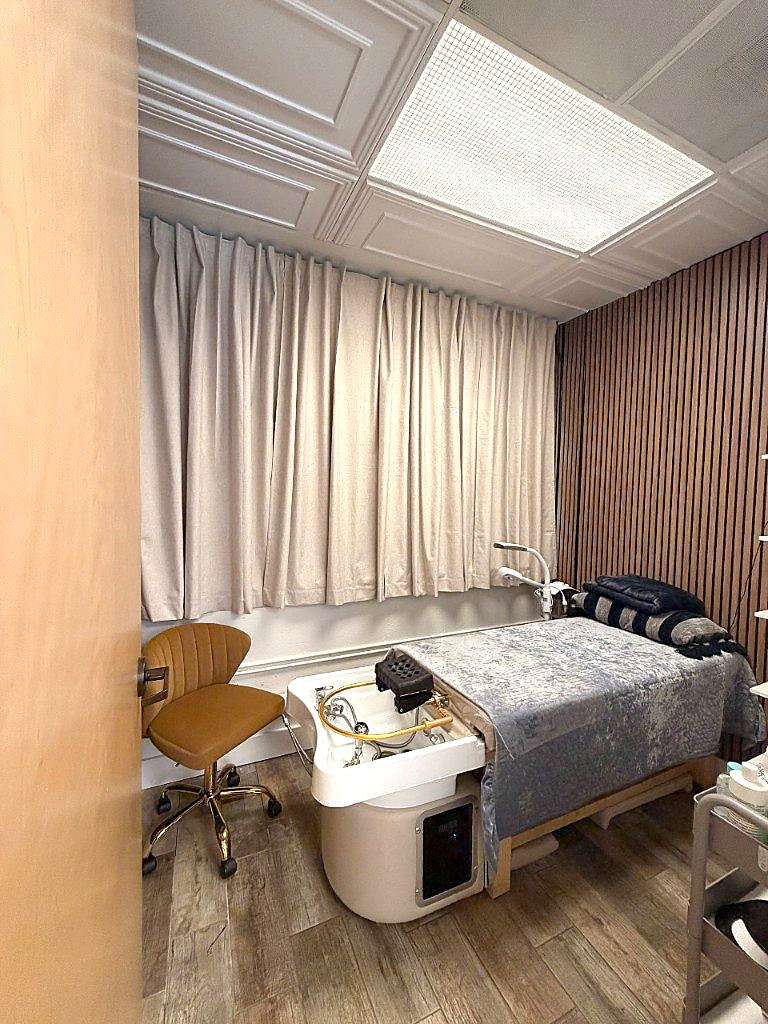 Private Head Spa suite with wood-slat walls at Coastal Polish & Beauty