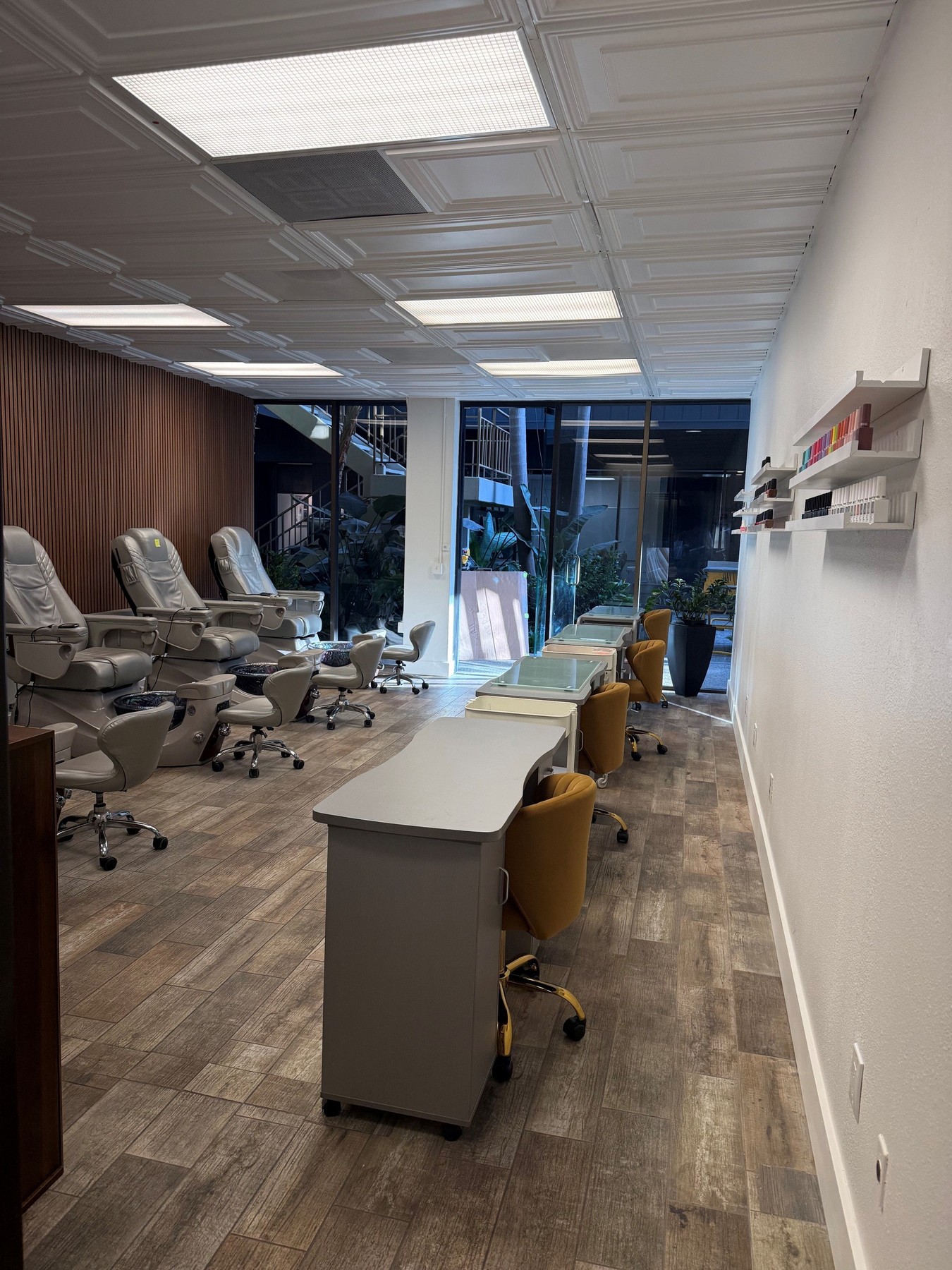 Manicure and pedicure stations inside the Coastal Polish & Beauty salon
